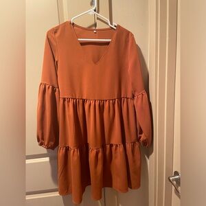 Gently used dress from Amazon, rust orange color. Super comfortable!